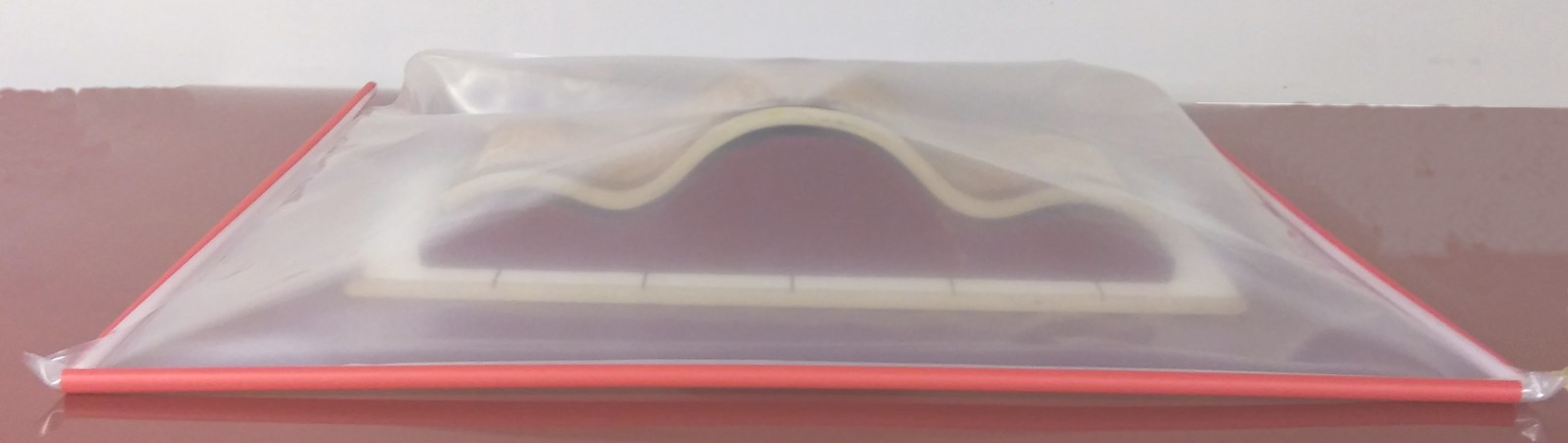 applying the third c channel to the three sided bag