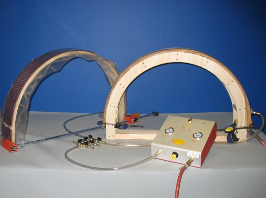 long narrow vacuum bag for bent lamination with the form outside of the bag
